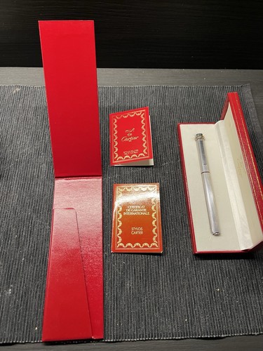 Cartier must de - must,