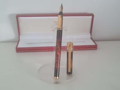 Must cartier les - -,
